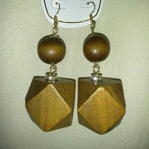 Beautiful fashionable wooden earrings